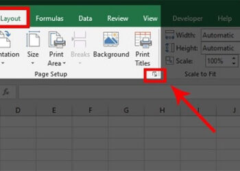 Vào Page layout nhấn vào biểu tượng mũi tên đi xuống trong mục Page Setup