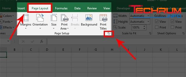 Vào Page layout nhấn vào biểu tượng mũi tên đi xuống trong mục Page Setup
